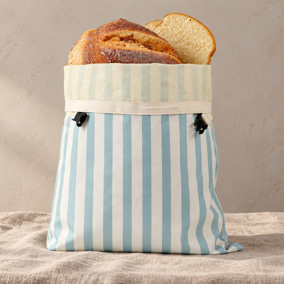Bread bag standing on a linen tablecloth