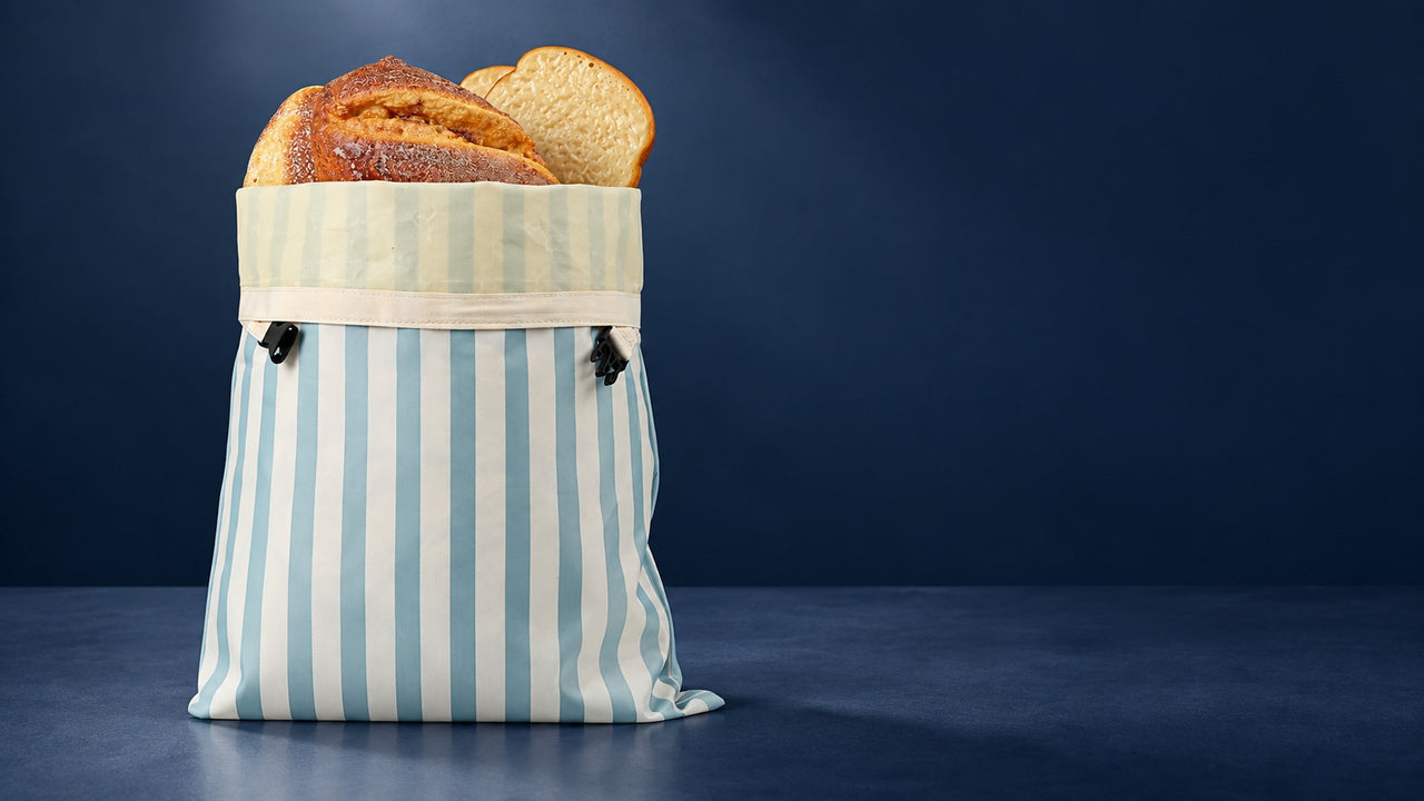 Bread bag with sourdough against a midnight blue backdrop
